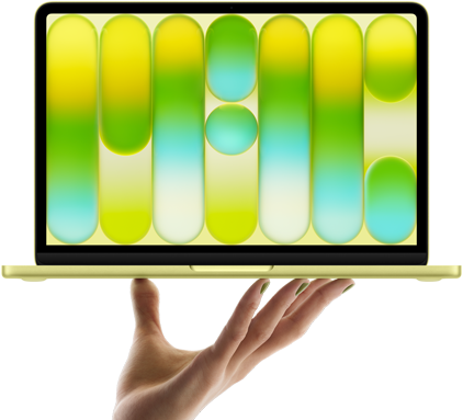 MacBook Neo citrusszínben egy nyitott kéz ujjbegyein egyensúlyozva, a kijelzőn színes, absztrakt minta látható