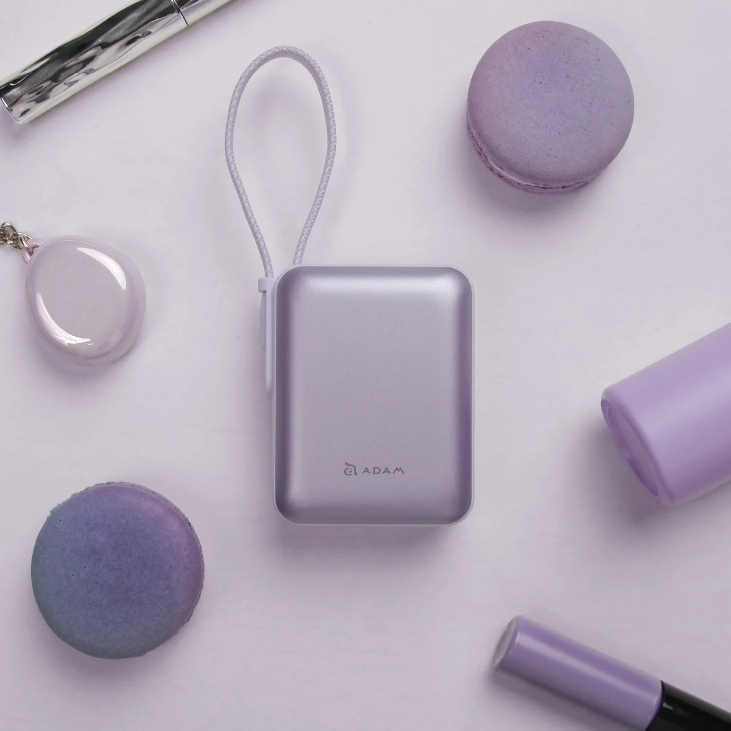 ADAM elements VIONTA Q 10 000 mAh kompakt powerbank beépített kábellel - lila