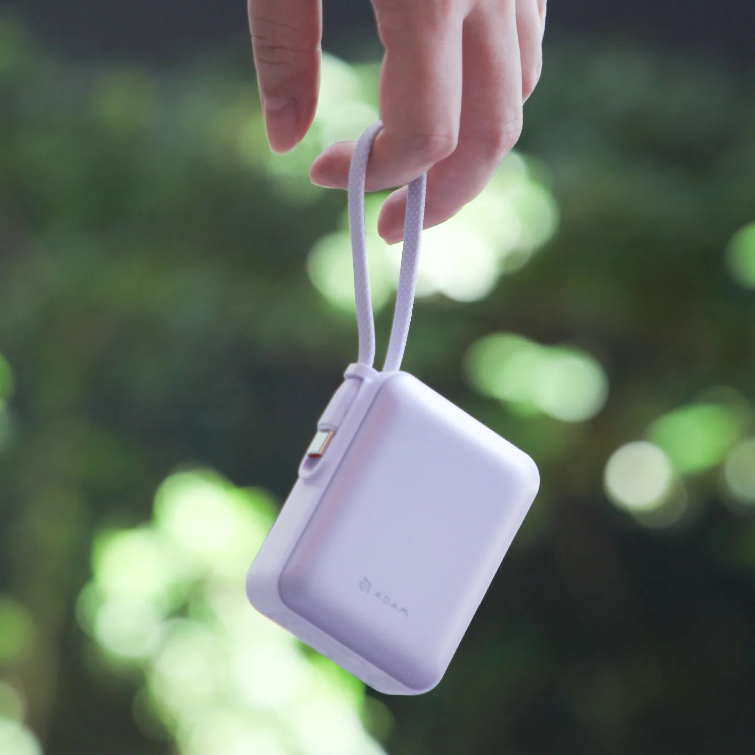 ADAM elements VIONTA Q 10 000 mAh kompakt powerbank beépített kábellel - lila